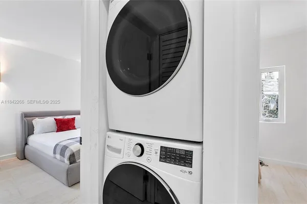 a kitchen with stainless steel appliances a refrigerator and a stove
