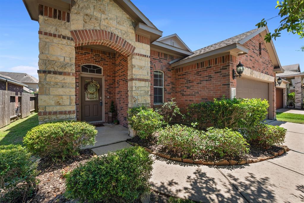 Imagine being the new owner of  this lovely brick and stone home on a cul de sac street.