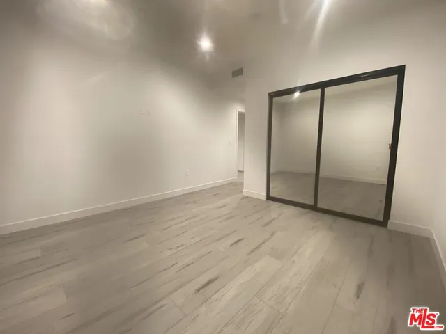 a bathroom with a granite countertop shower