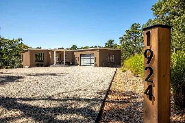 a view of balcony with wooden floor and fence
