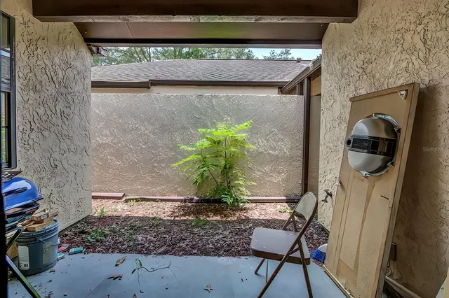 a backyard of a house with lots of green space