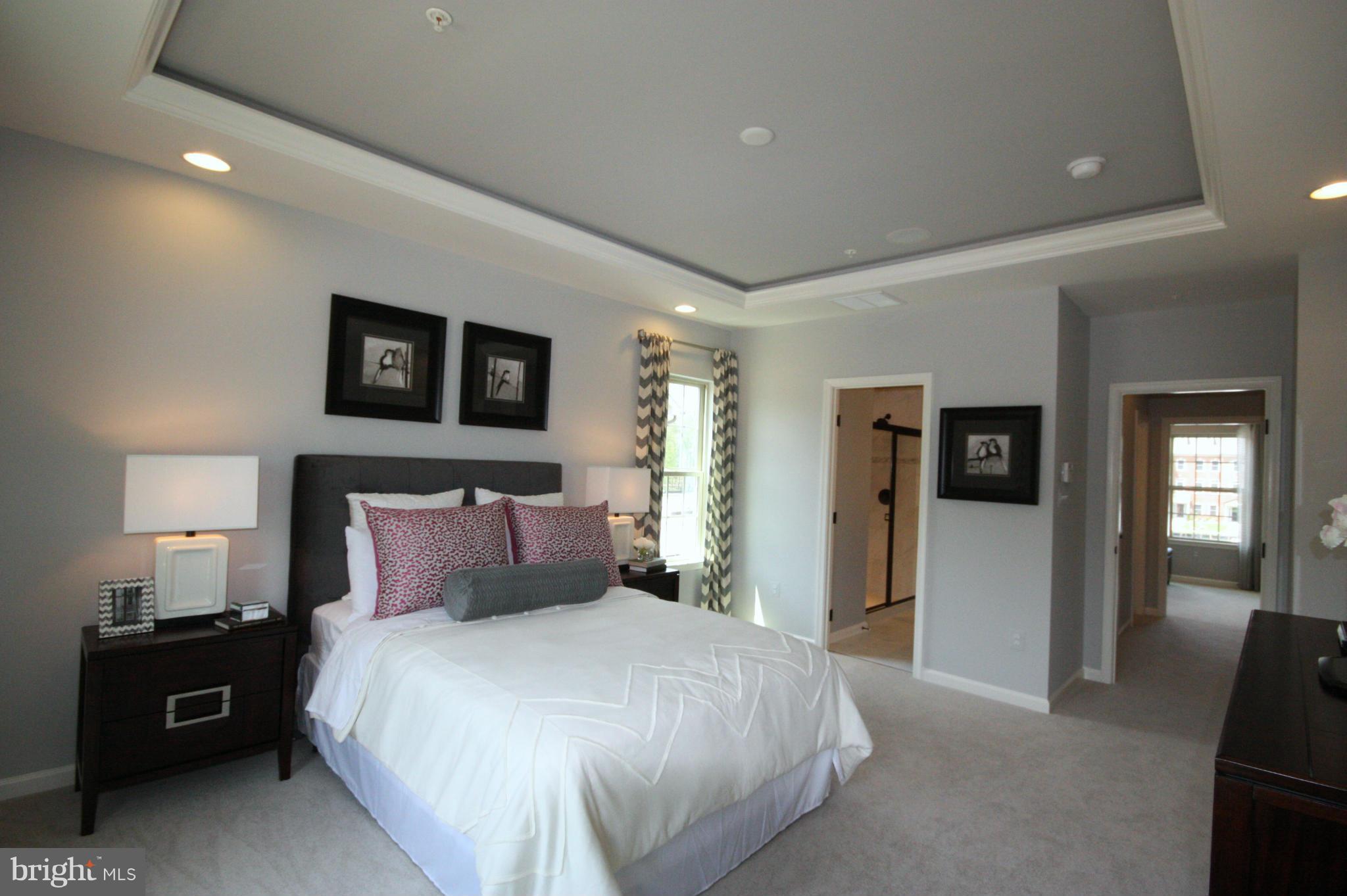 3108 Potters Hill Road Hanover, MD 21076 - Photo 5 of 30 a bedroom with a bed and a lamp