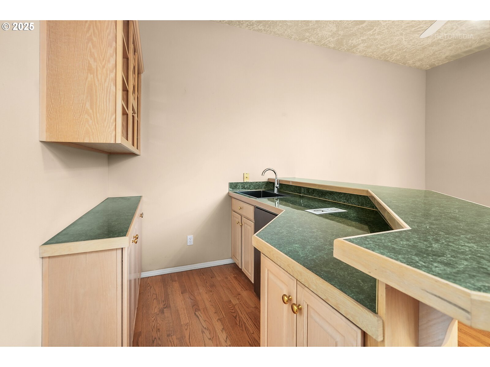 2525 Northwest 141st Place Portland, OR 97229 - Photo 21 of 48 a kitchen with a sink and cabinets