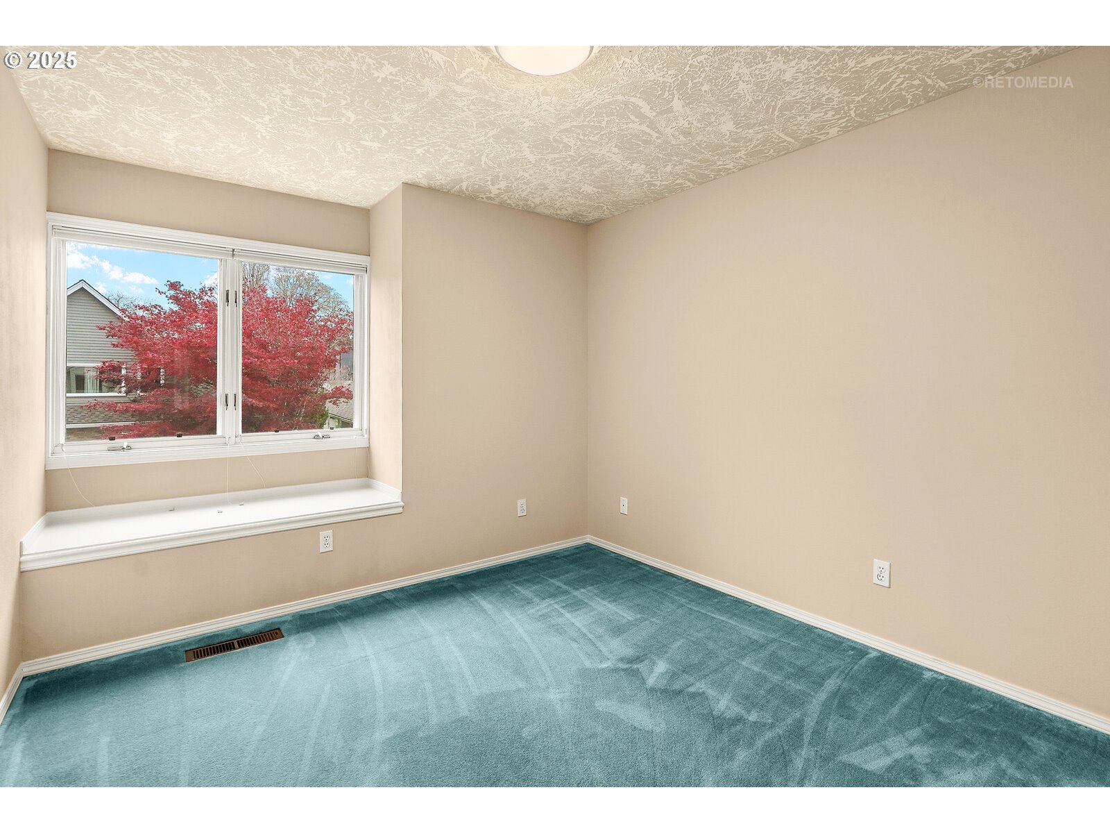 2525 Northwest 141st Place Portland, OR 97229 - Photo 35 of 48 a view of an empty room with a window