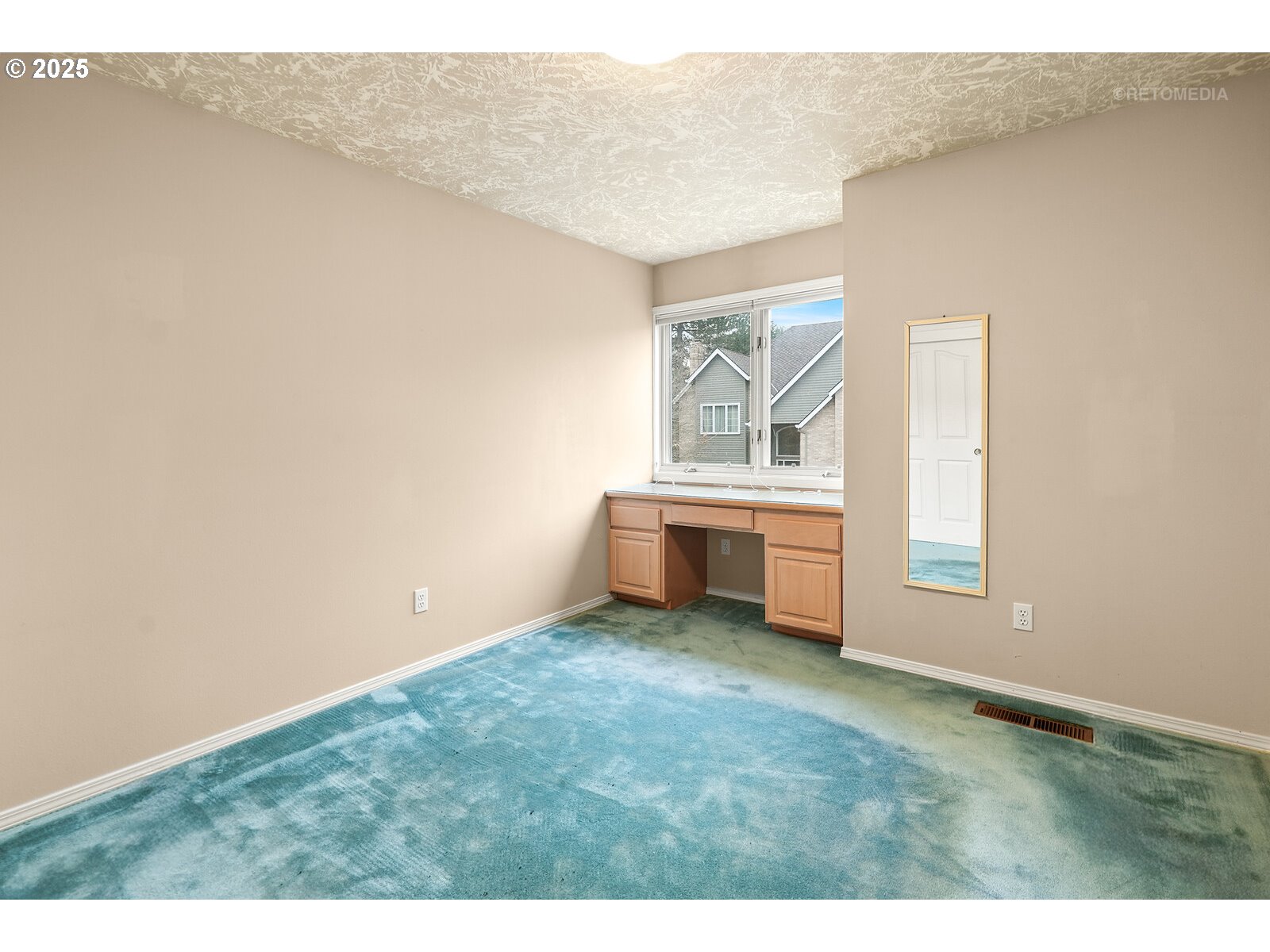 2525 Northwest 141st Place Portland, OR 97229 - Photo 38 of 48 a room with a window and a kitchen