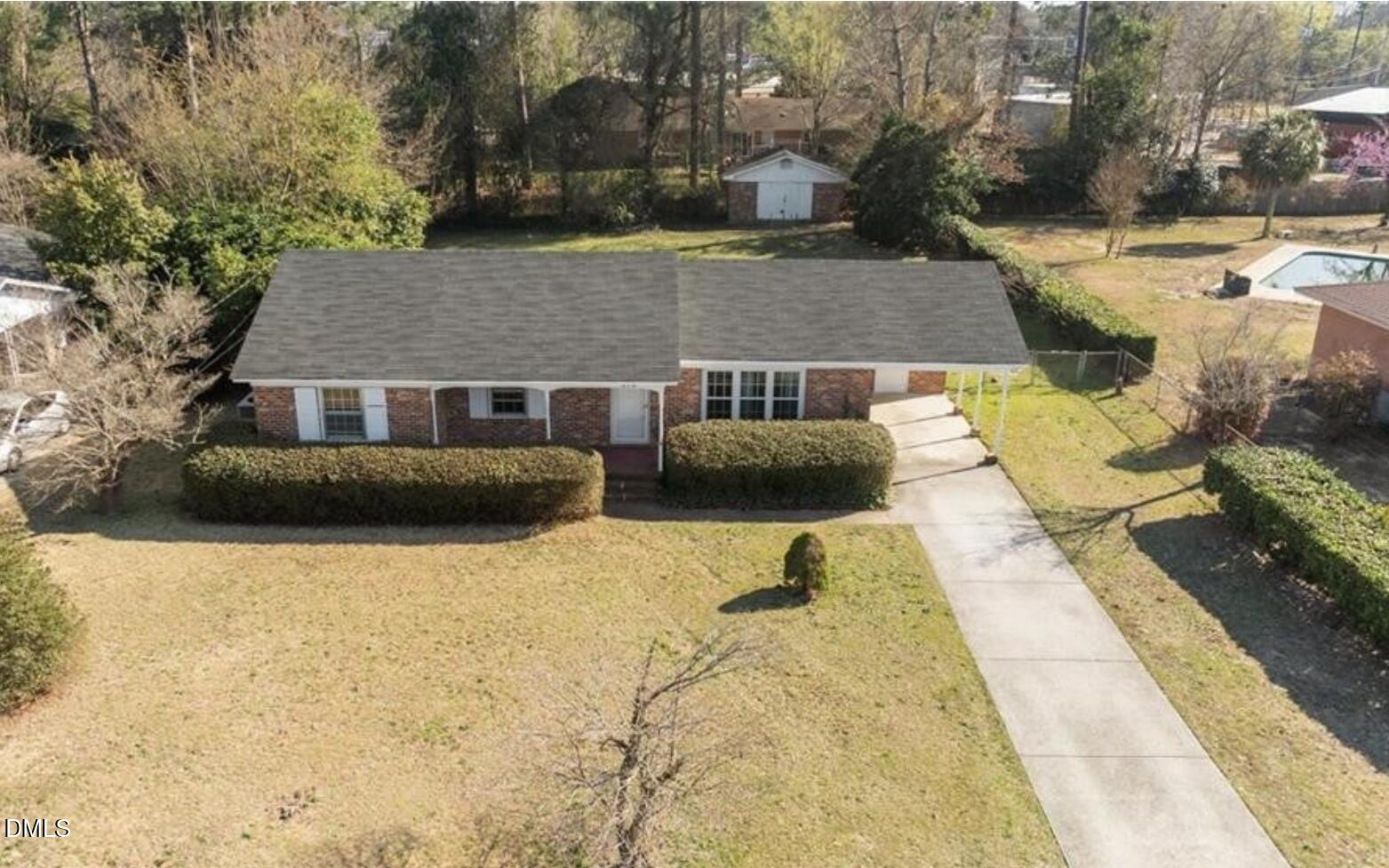 414 York Road Fayetteville, NC 28303 - Photo 12 of 14 a view of house with yard and swimming pool