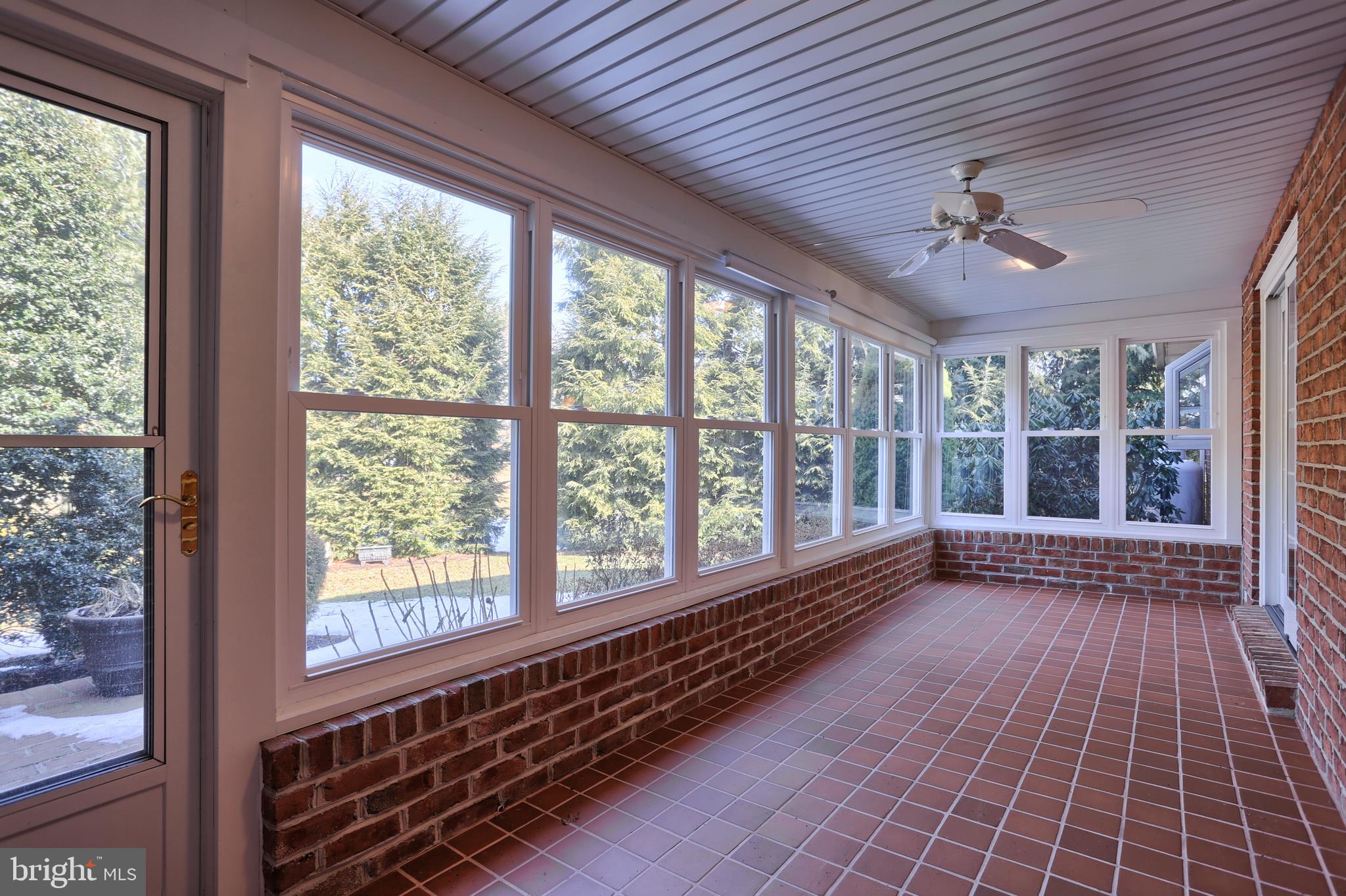35 Mine Road Lebanon, PA 17042 - Photo 17 of 37 Sunroom with tile flooring, access to rear yard