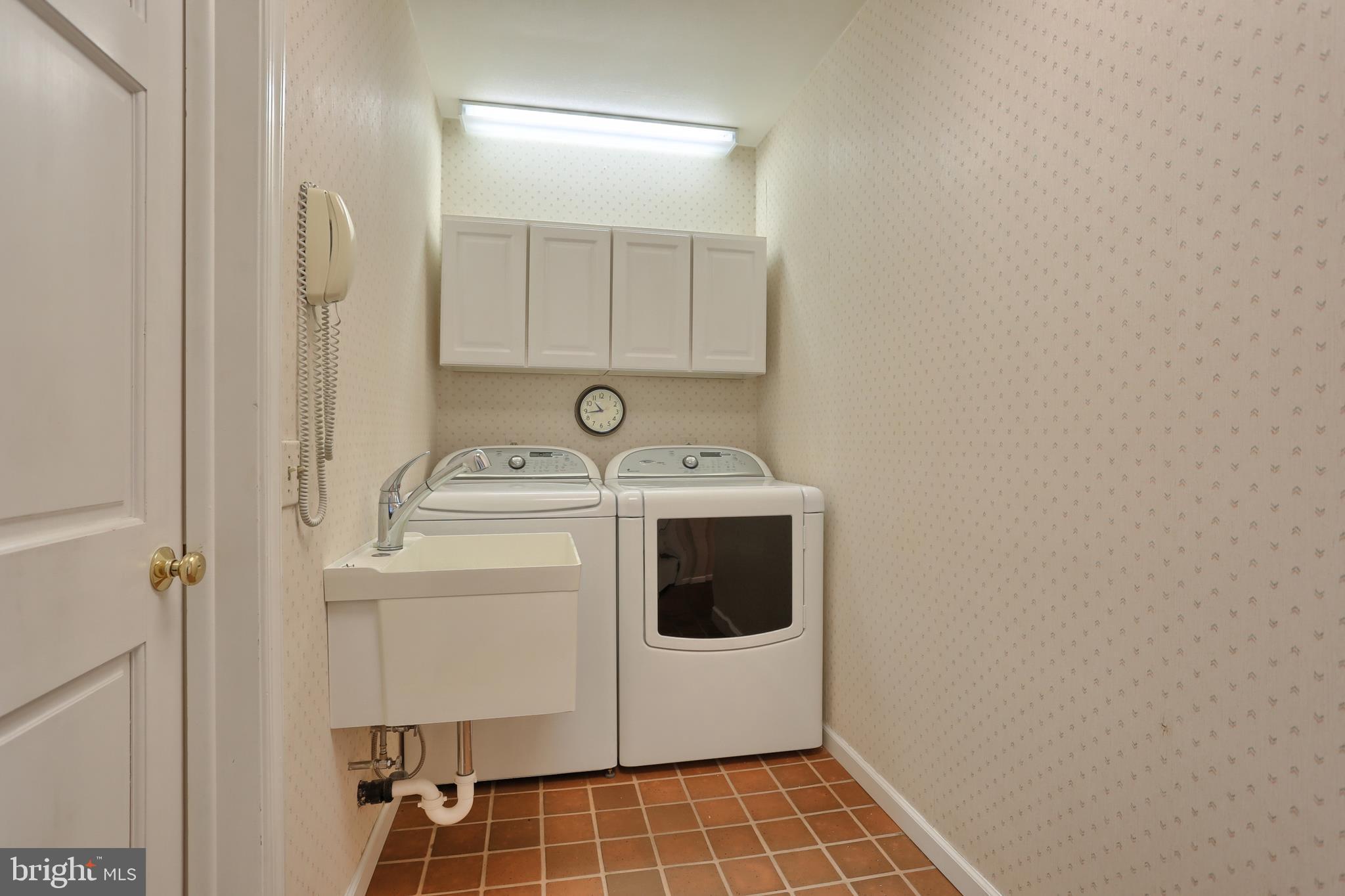 35 Mine Road Lebanon, PA 17042 - Photo 18 of 37 Main level laundry, utility sink, cabinetry