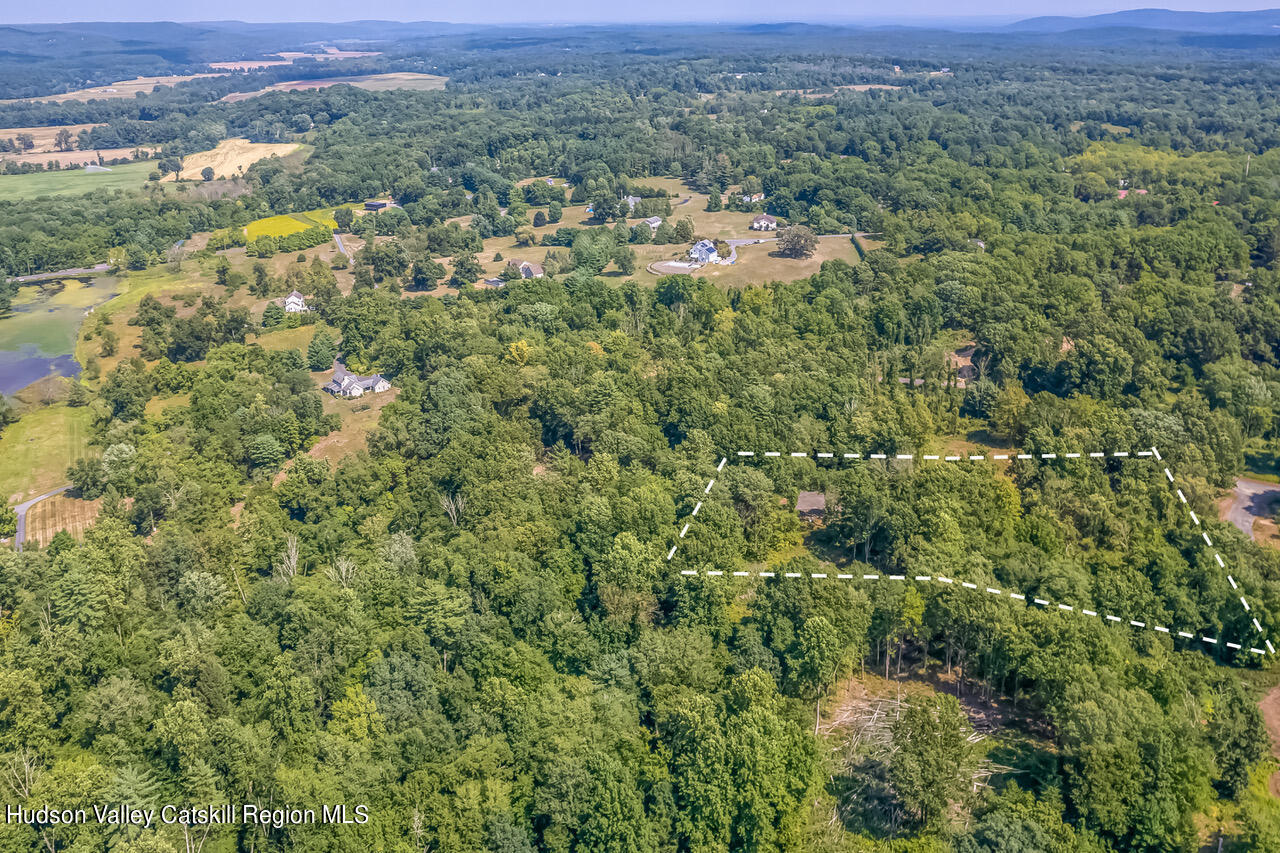 32 Van Derburgh Stone Ridge, NY 12484 - Photo 1 of 1 an aerial view of a houses with a lush green hillside