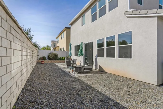 a bathroom with a toilet a sink and a mirror