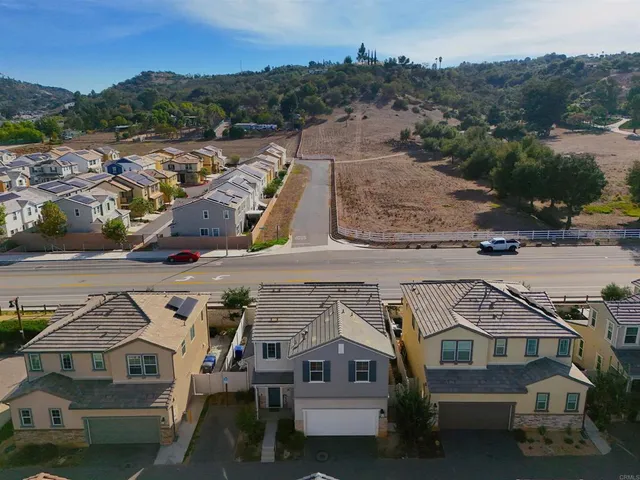 an aerial view of a house with a garden