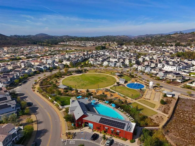 a view of a swimming pool with a lake view