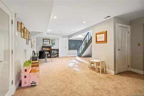 a view of livingroom with furniture and staircase