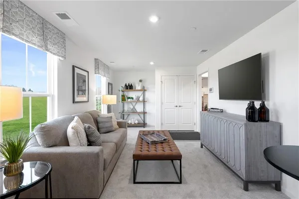 a view of balcony with furniture