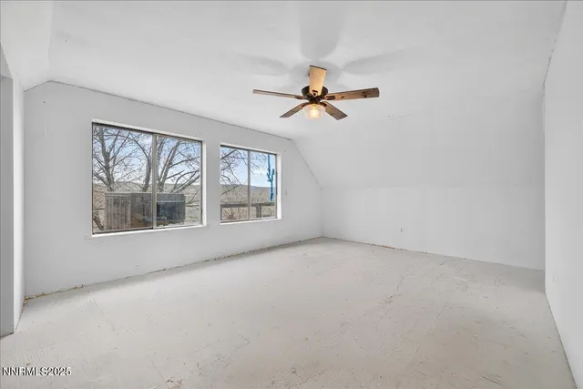 a view of empty room with windows
