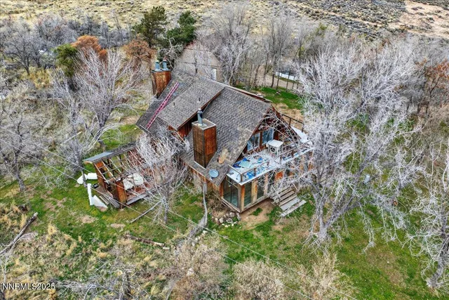 a view of house with yard