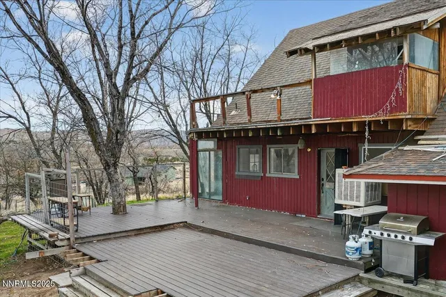 a red brick building with trees in front of it