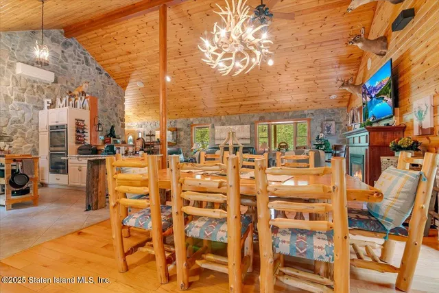 a bathroom with a toilet a sink and a mirror