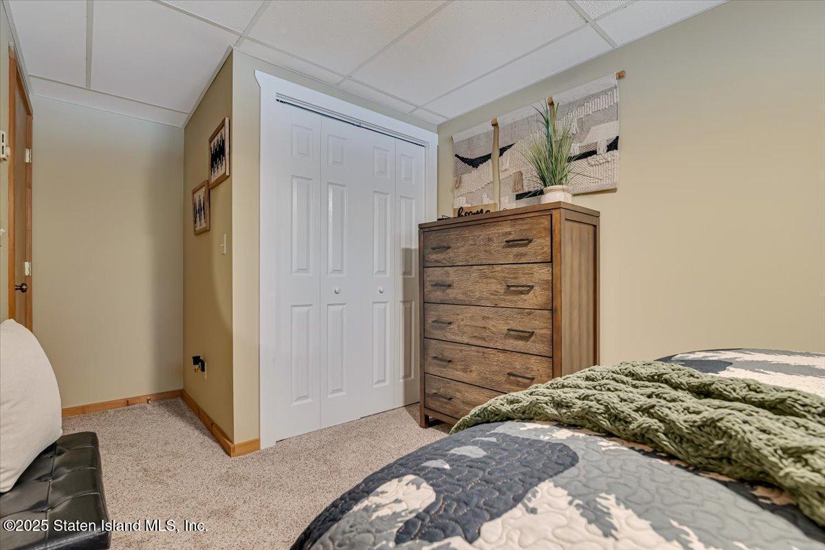 134 Split Rock Road Dingmans Ferry, PA 18328 - Photo 44 of 84 a bedroom with a bed and furniture