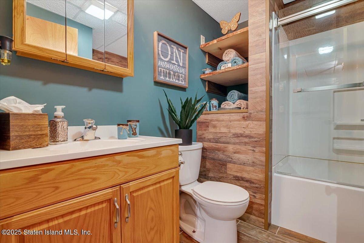 134 Split Rock Road Dingmans Ferry, PA 18328 - Photo 48 of 84 a bathroom with a sink a toilet and shower