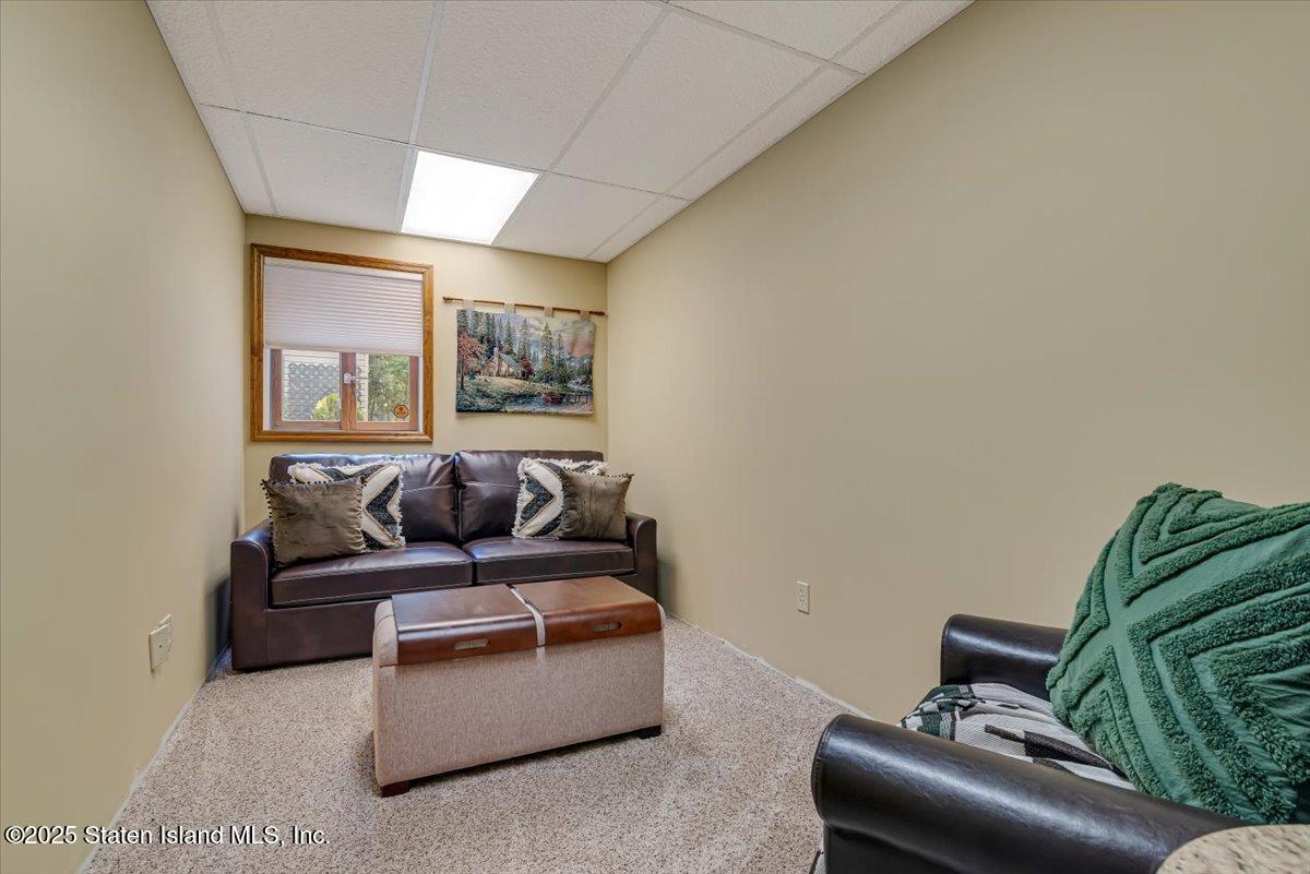 134 Split Rock Road Dingmans Ferry, PA 18328 - Photo 52 of 84 a living room with furniture and a couch