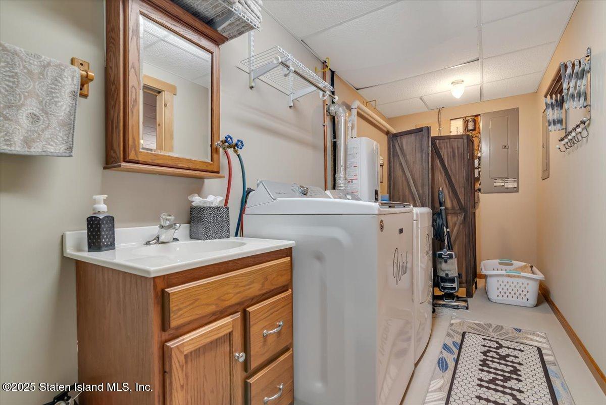 134 Split Rock Road Dingmans Ferry, PA 18328 - Photo 58 of 84 a utility room with dryer and washer