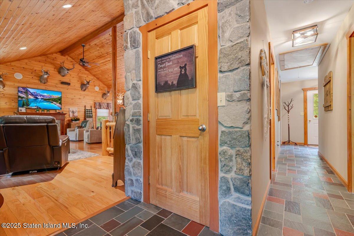 134 Split Rock Road Dingmans Ferry, PA 18328 - Photo 7 of 84 living room hall entry
