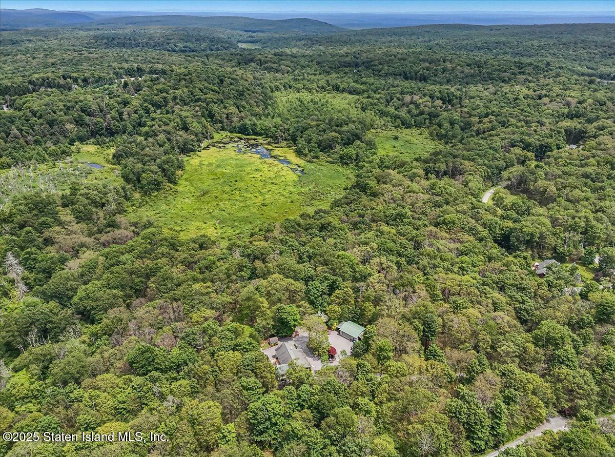 134 Split Rock Road Dingmans Ferry, PA 18328 - Photo 82 of 84 a view of a field with an outdoor space