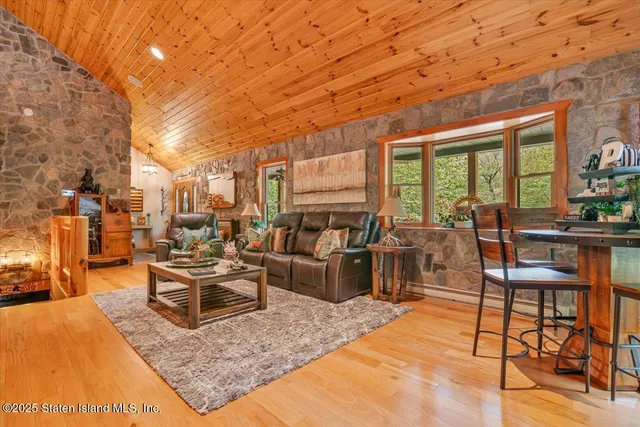 a kitchen with stainless steel appliances granite countertop a stove and cabinets