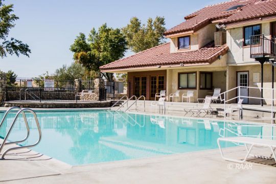 331 West Pilgrim Court Ridgecrest, CA 93555 - Photo 34 of 35 a view of a swimming pool with chairs
