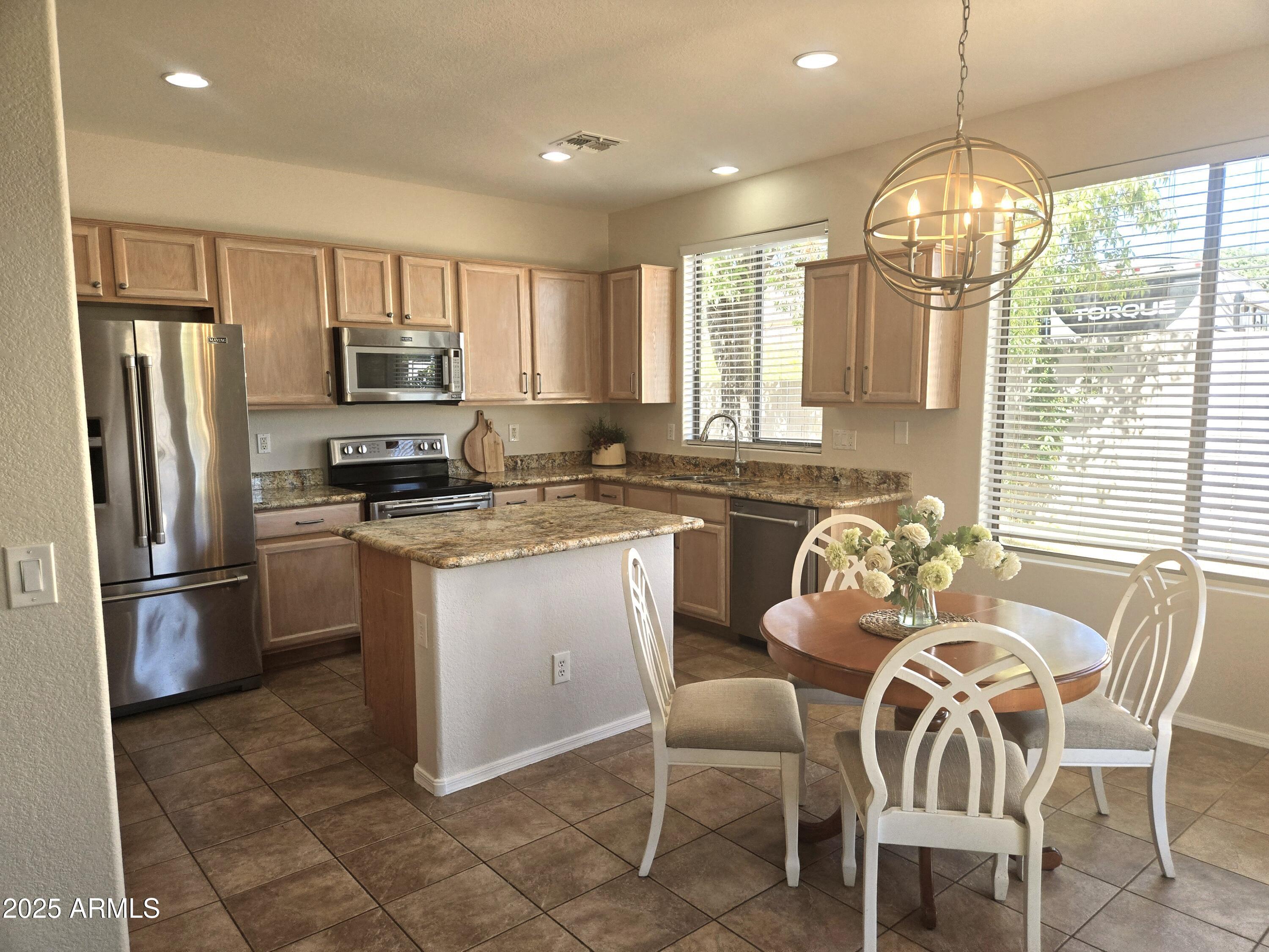 1187 South Hazel Street Gilbert, AZ 85296 - Photo 14 of 50 Spacious kitchen with stainless applianc