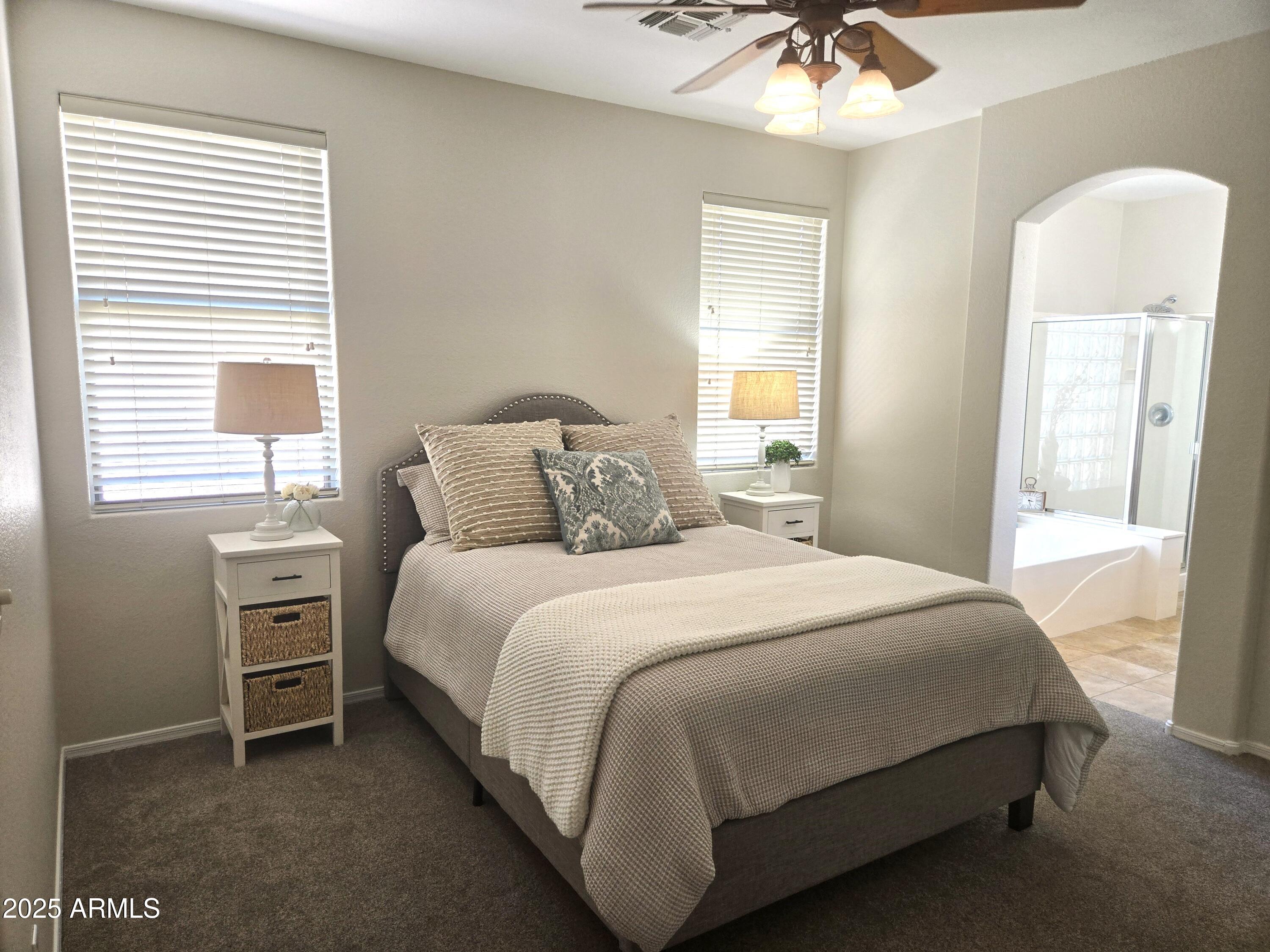 1187 South Hazel Street Gilbert, AZ 85296 - Photo 18 of 50 a bedroom with a bed and a window