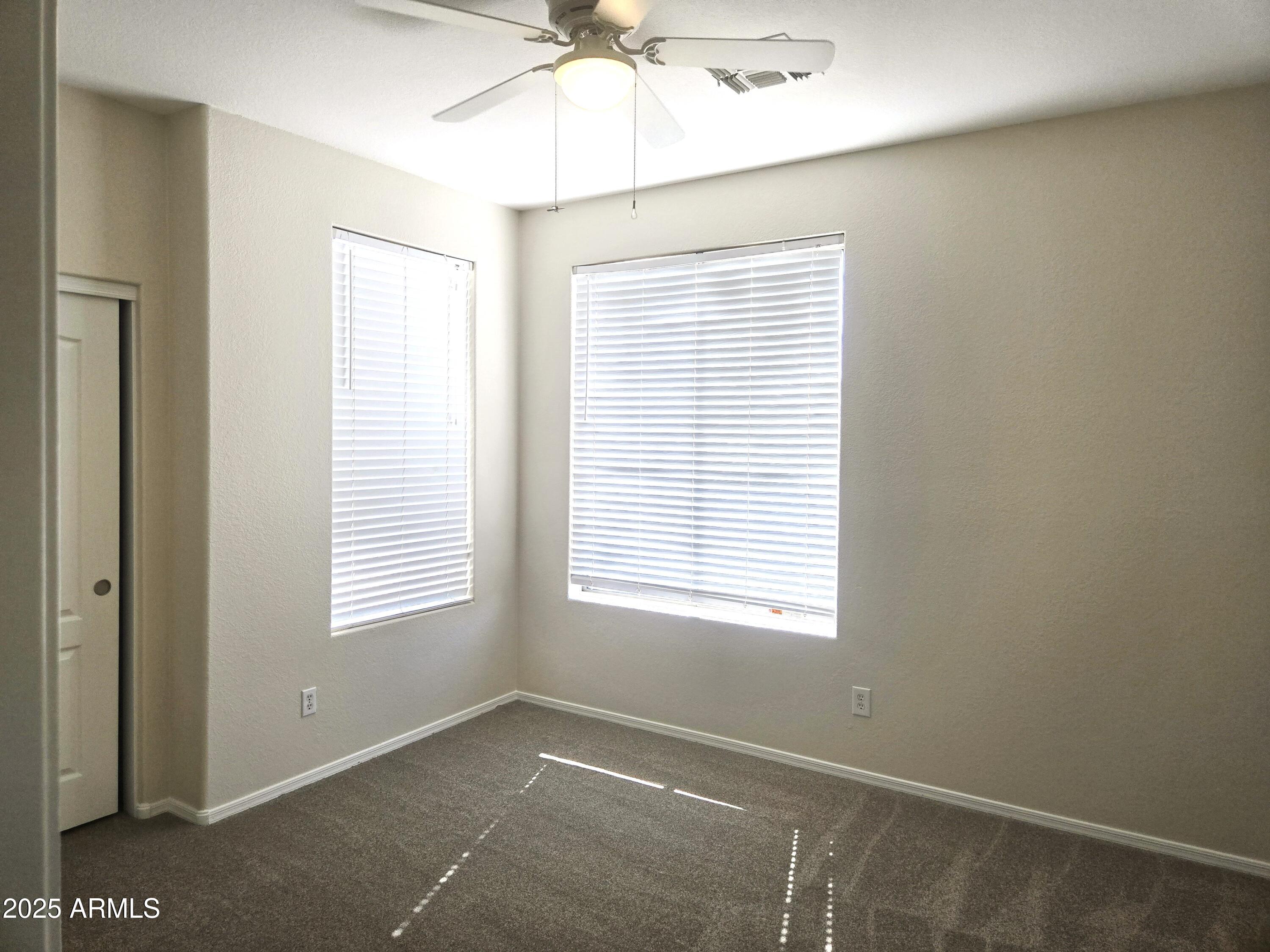 1187 South Hazel Street Gilbert, AZ 85296 - Photo 36 of 50 a view of an empty room with a window