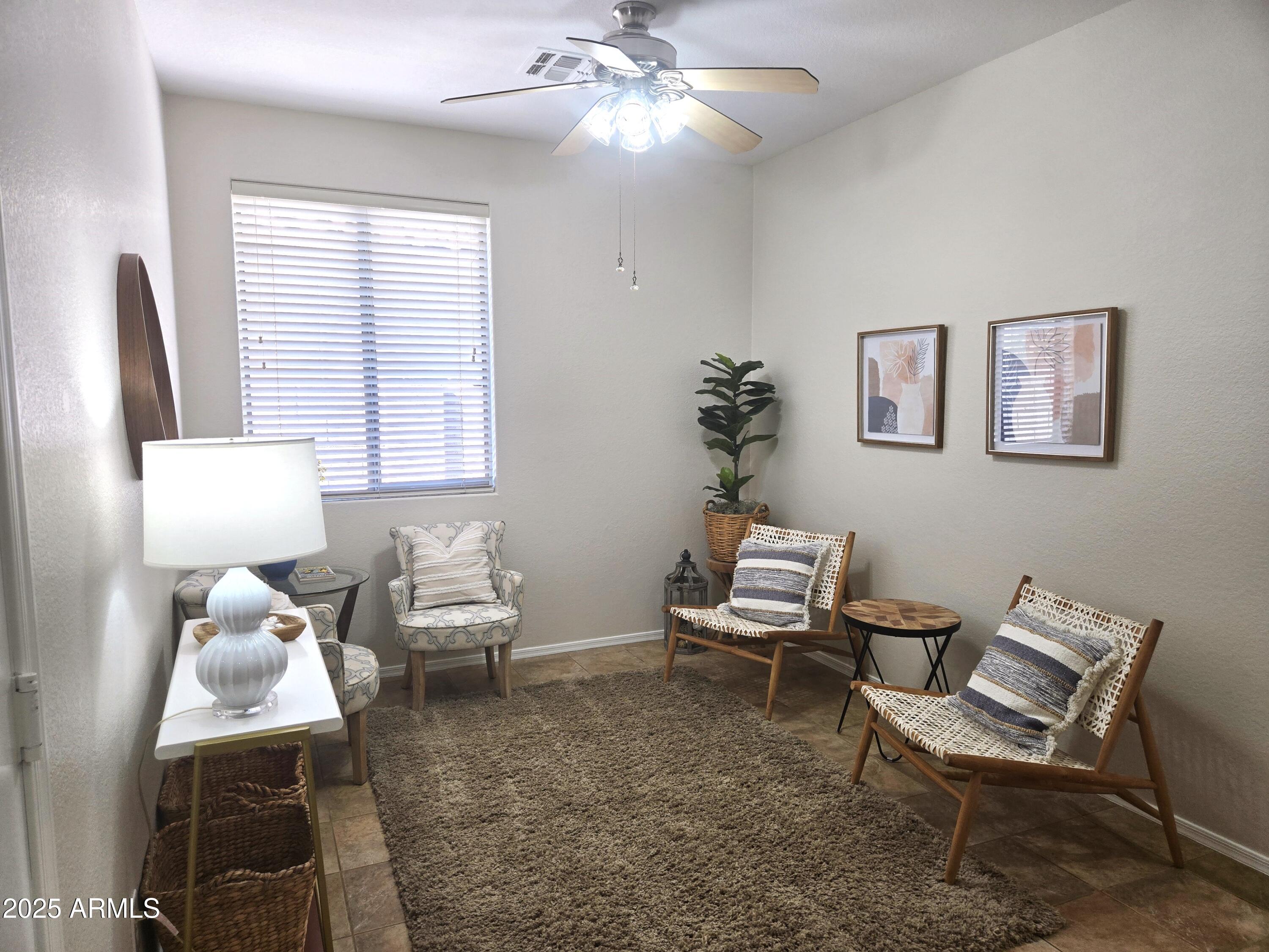 1187 South Hazel Street Gilbert, AZ 85296 - Photo 39 of 50 a living room with furniture and a window