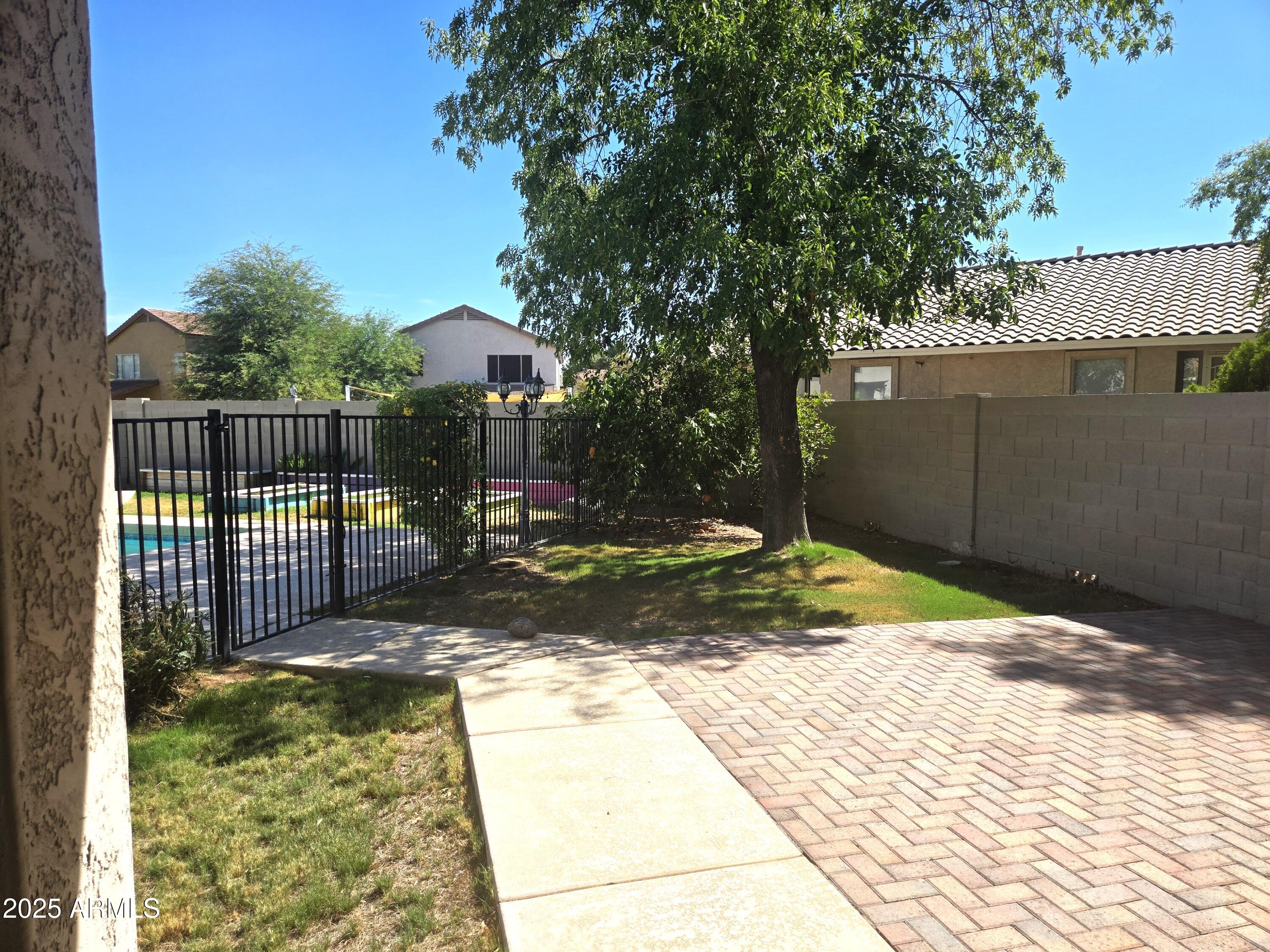 1187 South Hazel Street Gilbert, AZ 85296 - Photo 6 of 50 Beautiful harringbone patio for entertai