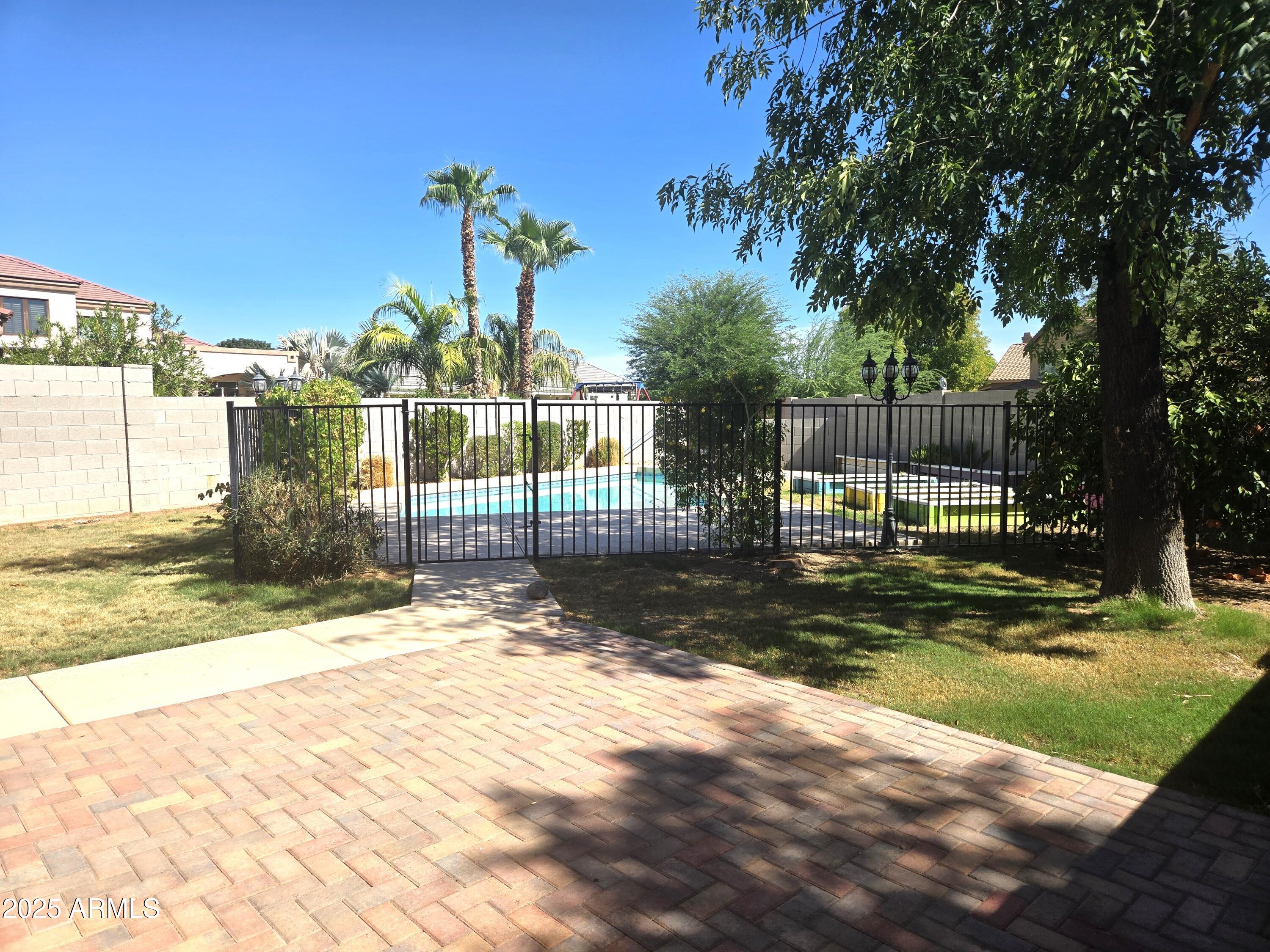 1187 South Hazel Street Gilbert, AZ 85296 - Photo 7 of 50 Oversized gated back yard with Pool & L