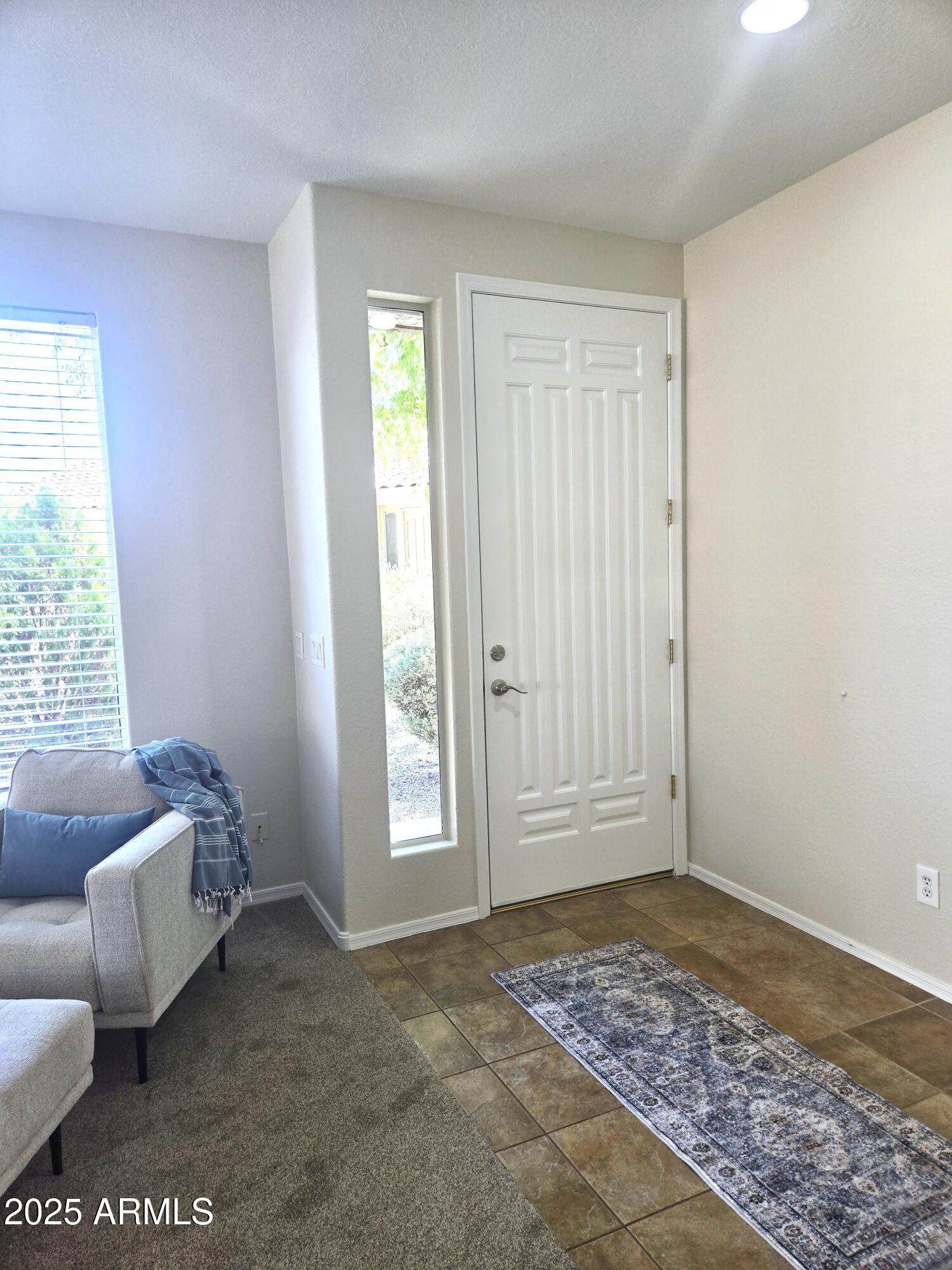 1187 South Hazel Street Gilbert, AZ 85296 - Photo 9 of 50 a view of livingroom with furniture and window