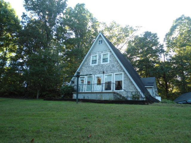 185 Maxwell Branch Road Cottontown, TN 37048 - Photo 1 of 15 Darling A-frame home tucked on tree filled 1.86 acres!