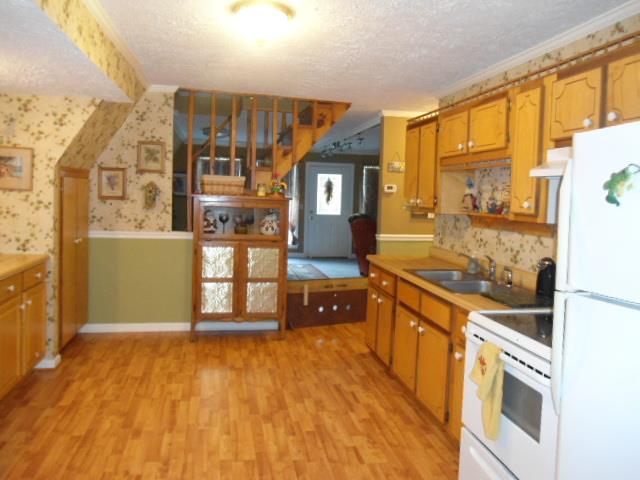185 Maxwell Branch Road Cottontown, TN 37048 - Photo 2 of 15 Open kitchen area with lots of counters and cabinets!