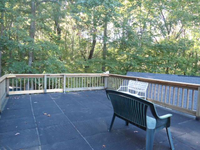 185 Maxwell Branch Road Cottontown, TN 37048 - Photo 11 of 15 Awesome deck to enjoy the wooded area