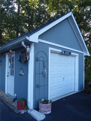 185 Maxwell Branch Road Cottontown, TN 37048 - Photo 12 of 15 1 car detached garage and the home has a workshop on the back of it!