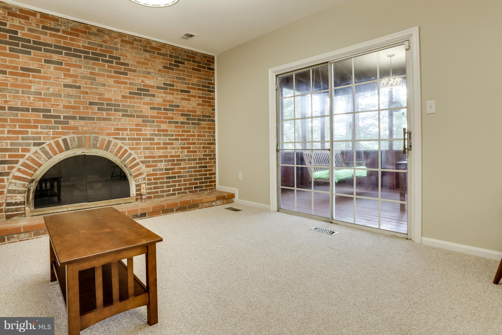 9235 Log Chain Road Columbia, MD 21045 - Photo 10 of 30 Family Room with slider to screened-in porch