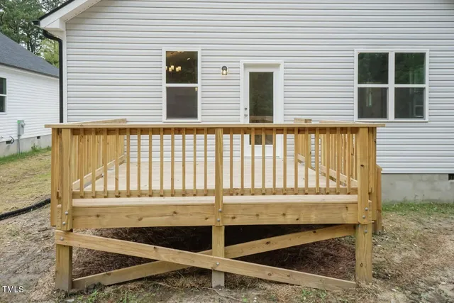 a black and white photo of a balcony