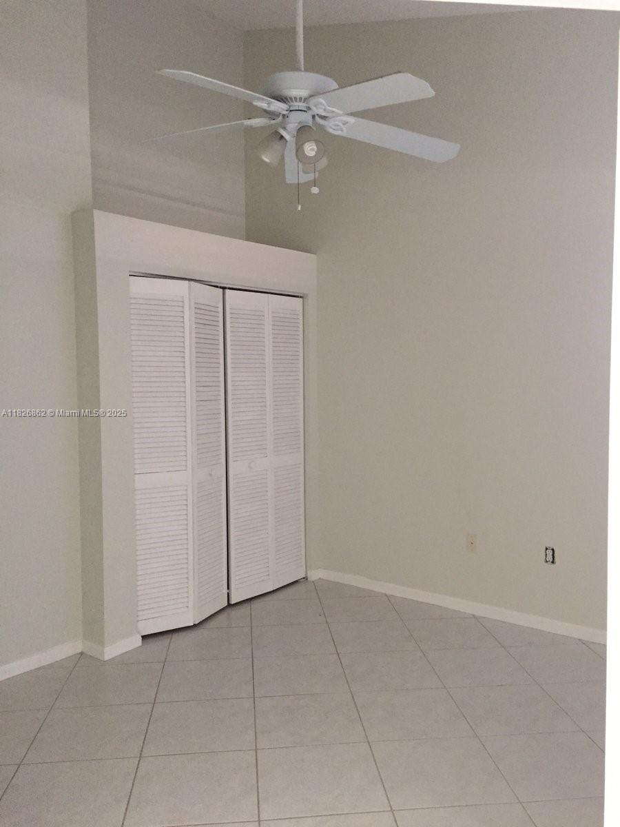 Boca del Mar Boca Raton, FL 33433 - Photo 8 of 11 an empty room with fan