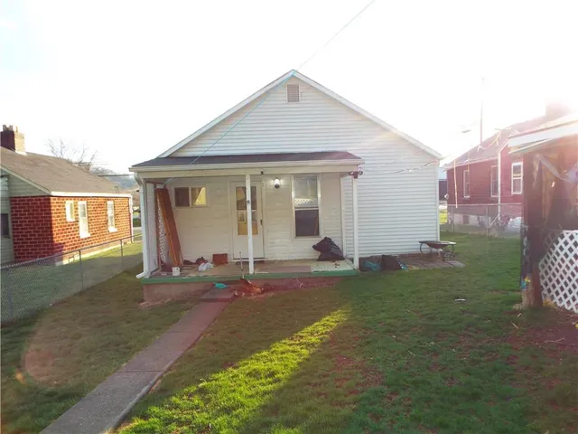 a view of a porch with furniture