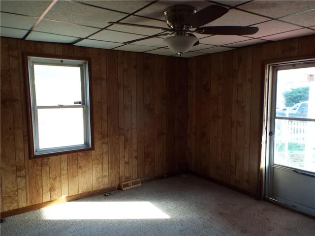 a view of an empty room with a window