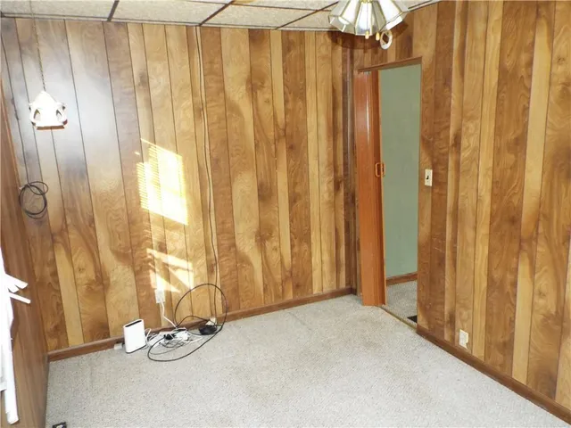 a view of a bathroom with a shower curtain