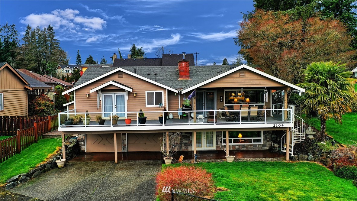 2104 Cedar Road Lake Stevens, WA 98258 - Photo 1 of 19 a front view of a house with a yard