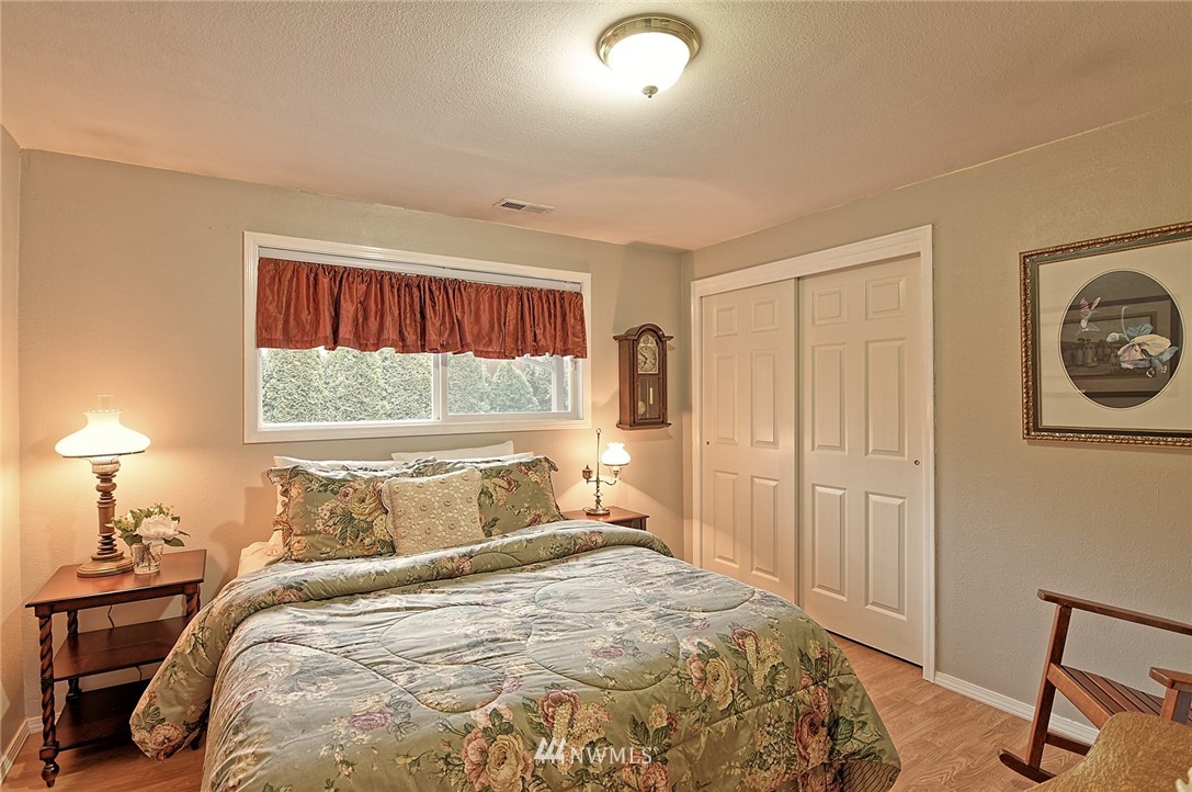 2104 Cedar Road Lake Stevens, WA 98258 - Photo 12 of 19 a bedroom with a bed and a window