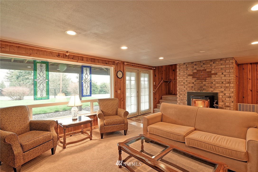 2104 Cedar Road Lake Stevens, WA 98258 - Photo 16 of 19 a living room with furniture and a large window
